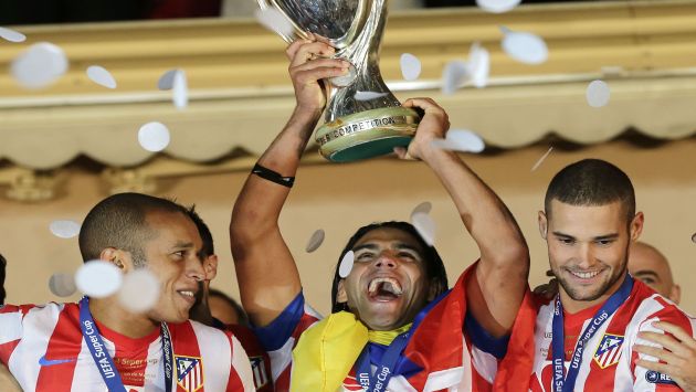 REYES. El Atlético celebró un nuevo título en Mónaco. (AP)