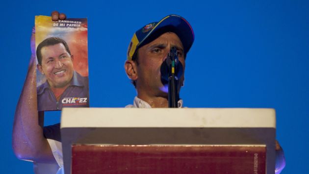 Ya no más. Capriles le advierte a Hugo Chávez que, así como el pueblo premia, castiga. (Reuters)