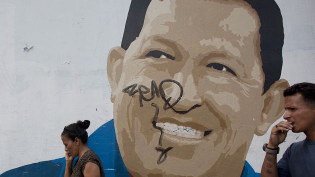 TODAVÍA NO. El chavismo apura el retorno de su líder a Caracas, pero minimizando los riesgos. (AP)