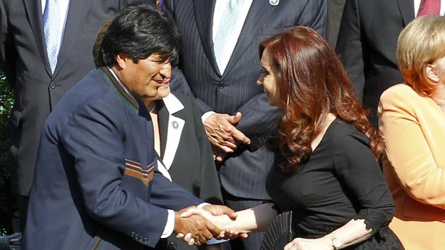 ‘HERMANOS’ EN EL LUJO. Evo Morales y Cristina Fernández no tienen prácticas y gustos muy austeros. (Reuters)