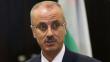 El primer ministro palestino dimitió tras 14 días en el cargo
