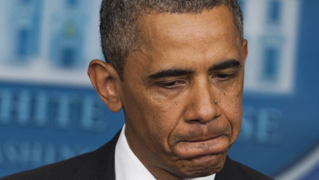 Solidario. Obama dio sentidas palabras a familia de la víctima. (AFP)