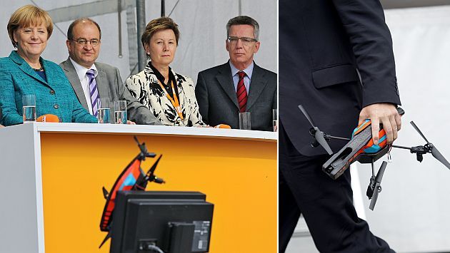 El drone fue retirado del escenario donde se presentó Angela Merkel. (AFP/AP)