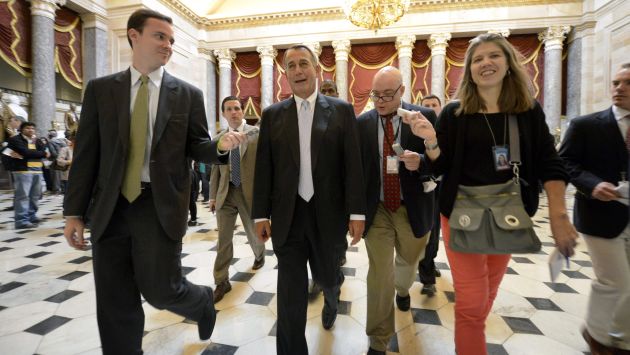 En sus trece . Titular de la Cámara de Representantes John Boehner (centro) no quiere el Obamacare. (EFE)