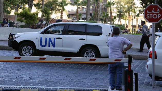 Llega de expertos de la OPAQ a un hotel de Damasco. (AFP)