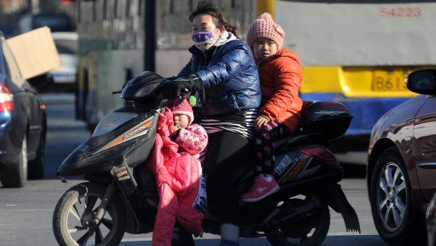 China pone fin a campos de reeducación y relaja ley del hijo único. (AFP)
