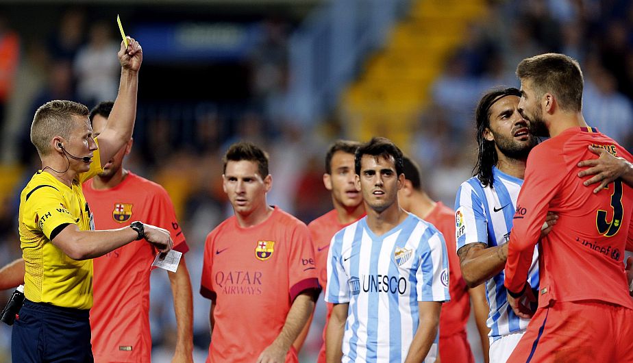 Barcelona igualó 0-0 con Málaga y sigue de líder en la Liga española. (EFE)