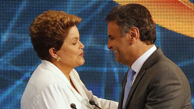 Dilma Rousseff supera por 1% a Aécio Neves en los sondeos. (Reuters)