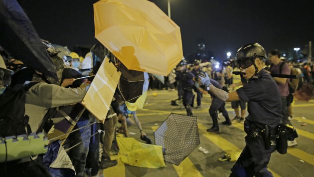 Manifestantes pertenecen al movimiento de los paraguas. (AP)