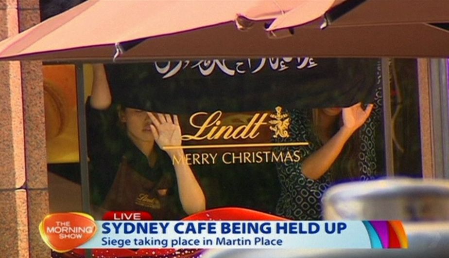 Estado Islámico habría tomado rehenes en un café de Sidney, Australia. (AP)