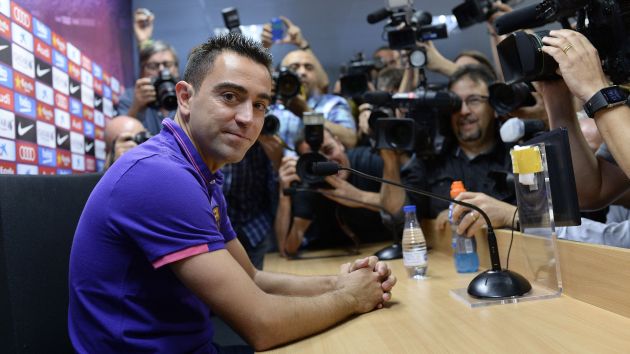 Xavi Hernández prometió volver algún día al Barcelona. (AFP)