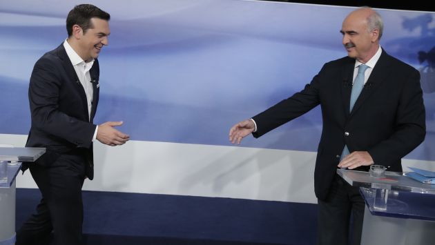 Empatados. Alexis Tsipras, líder del izquierdista Syriza, y Evangelos Meimarakis, conservador de Nueva Democracia, disputan el gobierno. (AP)