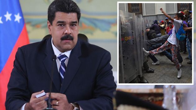 El chavismo ataca. Decenas de personas vinculadas al oficialismo obstaculizaron el ingreso al Congreso a miembros de la oposición entre golpes e insultos. Asimismo, manifestaron su respaldo al presidente Nicolás Maduro. (EFE)