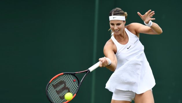 Mandy Minella jugó embarazada en Wimbledon. (AFP)